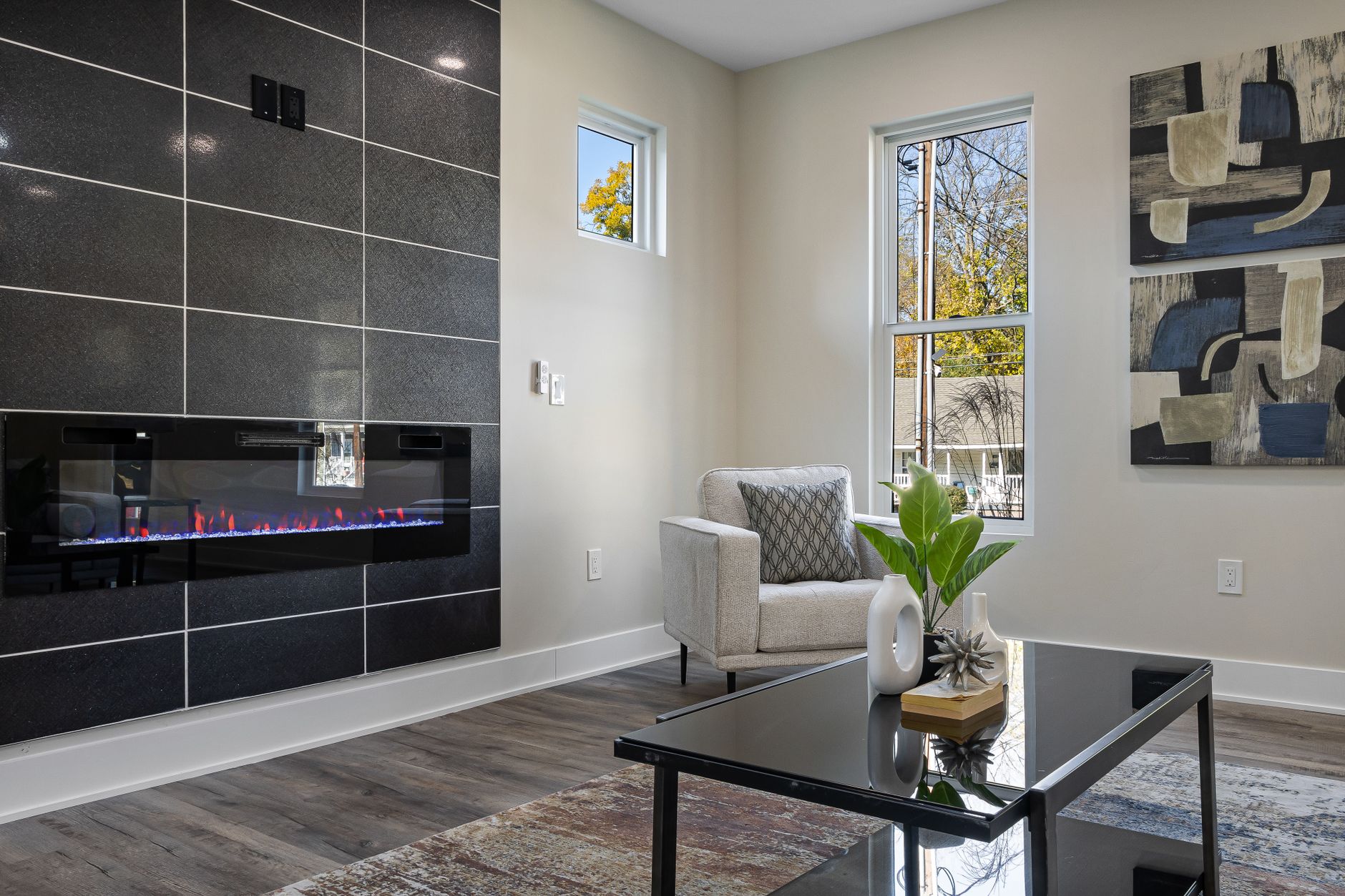 Stylish living room with a modern fireplace — fireplace installation service in Los Angeles
